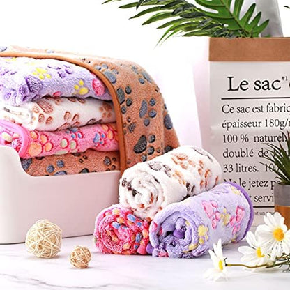 Tatuo 4 Pack Fleece Dog Blankets for Puppy Cats Multi-Size Sleep Mat for Pet Guinea Pig Soft Washable Warm Crate Bed Puppy Teething Toys Print Pattern Blanket Indoor(Mixed Color,30 x 20.5 Inch,Paw)